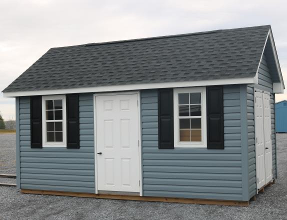 Pine Creek 10x16 Cape Cod with Twilight walls, White trim and Black Raised Panel shutters, and Charcoal shingles